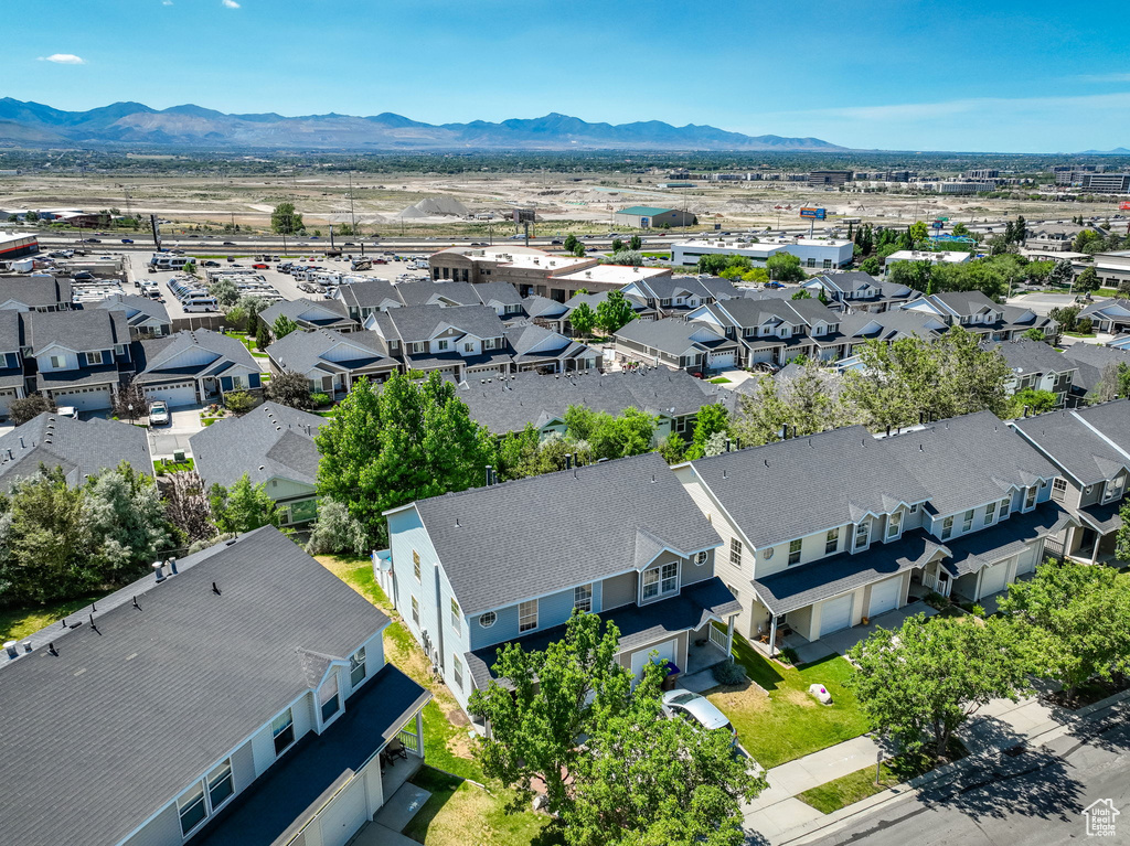 Aerial view of residential area featuring mountains
