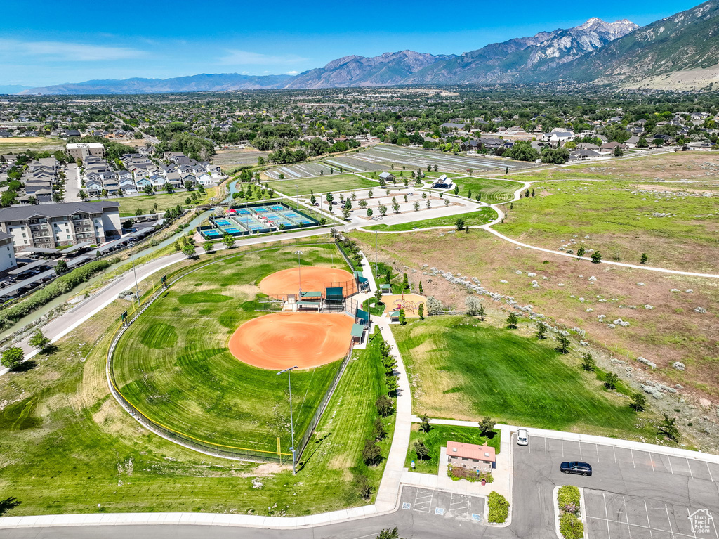 Aerial perspective of suburban area with a mountainous background