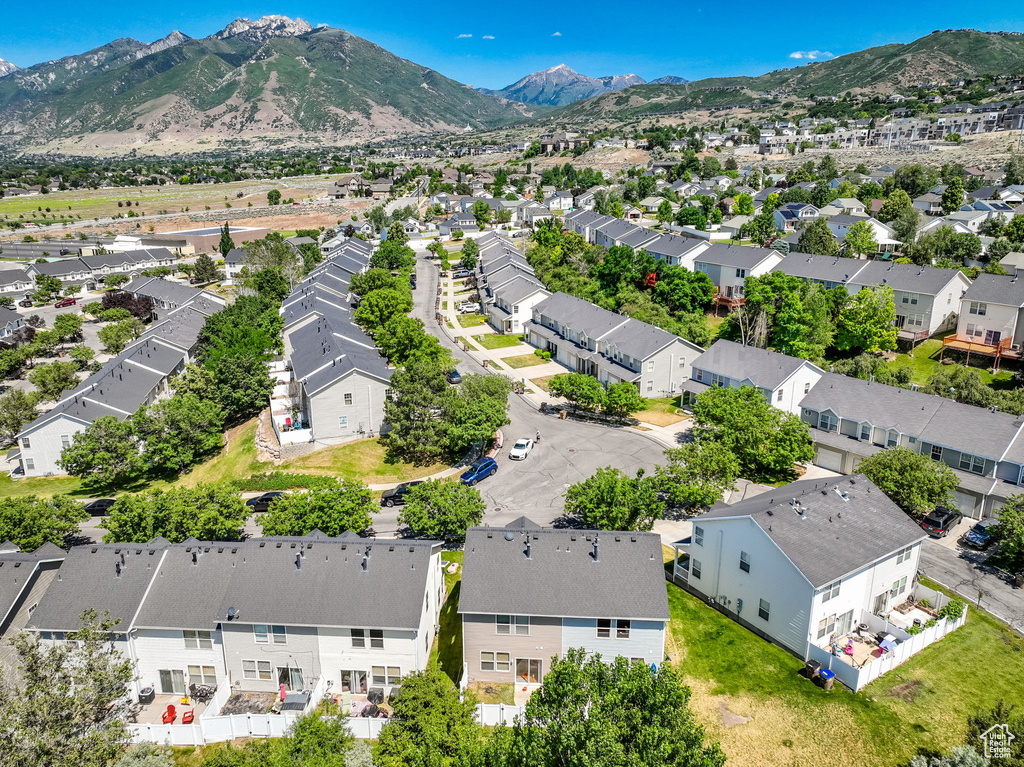 Aerial perspective of suburban area with mountains