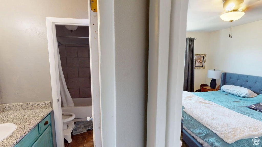 Bedroom featuring a sink