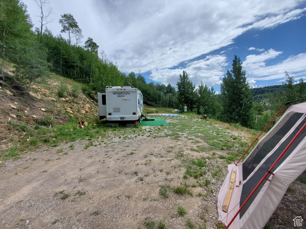 View of yard with a forest view