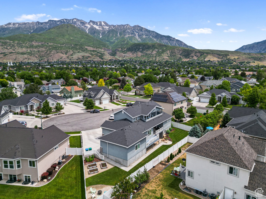 Aerial view of residential area with mountains