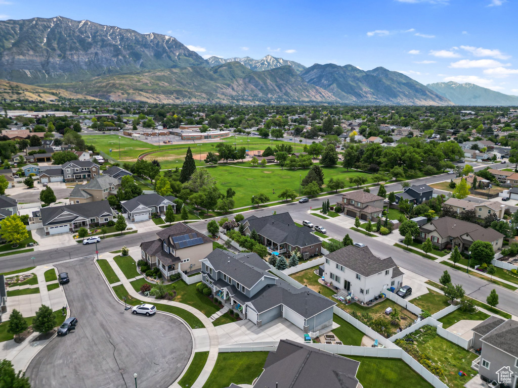 Aerial view of residential area featuring mountains