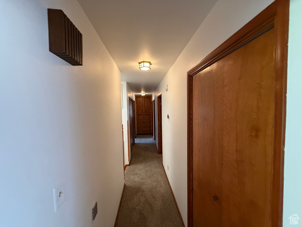 Corridor with carpet floors