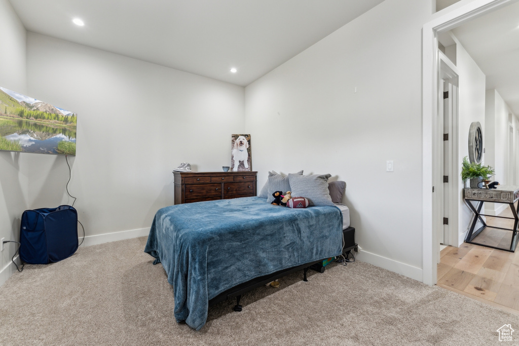 Bedroom featuring carpet, baseboards, and recessed lighting