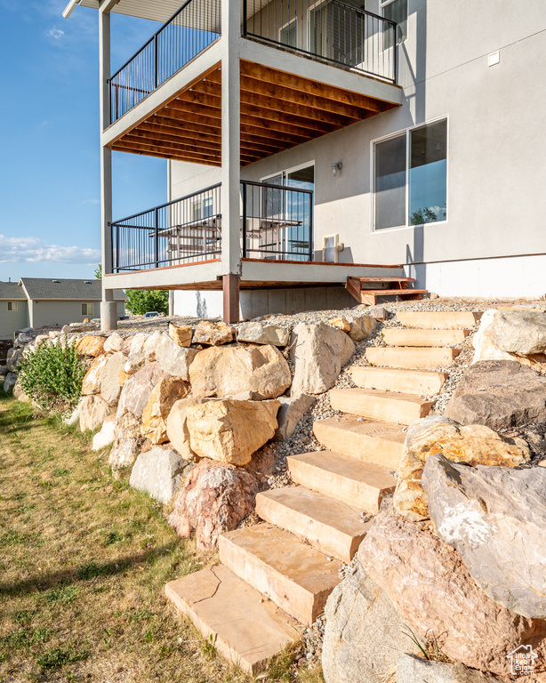 View of property exterior with a balcony