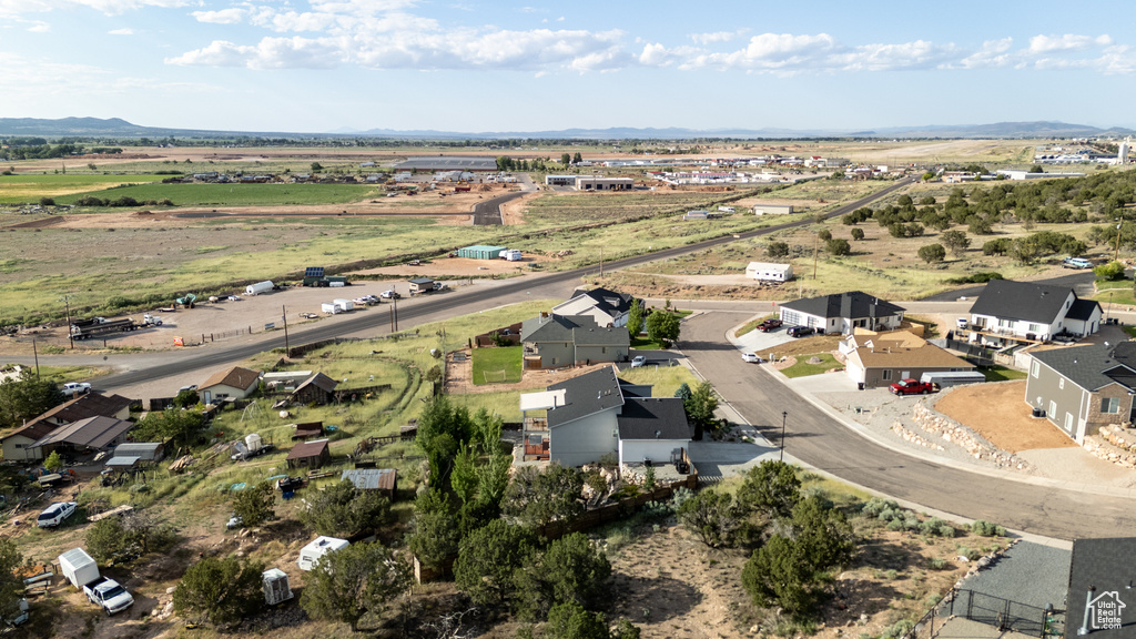 Aerial view of property\\\\\\\'s location with a mountain backdrop and nearby suburban area