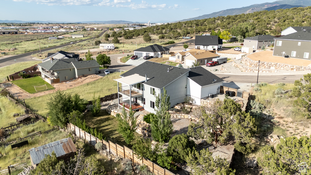 Aerial view of residential area with a mountain backdrop