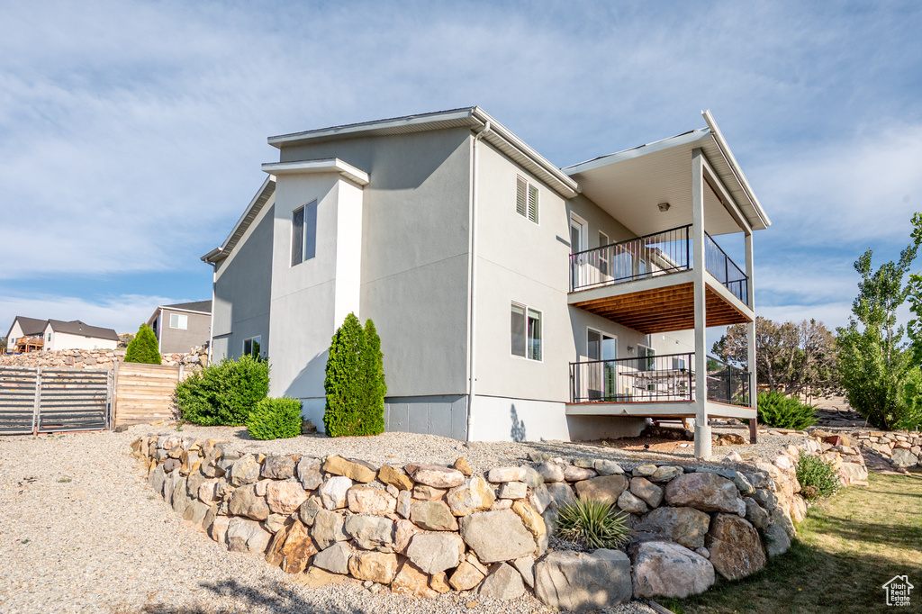 View of home\\\\\\\'s exterior featuring a balcony