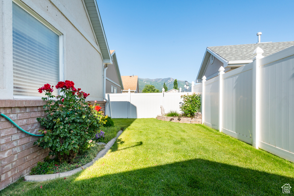 View of yard featuring a mountain view