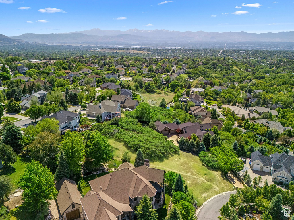 Aerial view of residential area with mountains