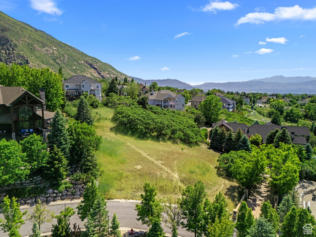 View of mountain backdrop with nearby suburban area