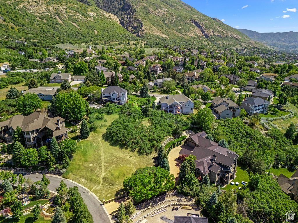 Aerial view of property\\\\\\\\\\\\\\\\\\\\\\\\\\\\\\\\\\\\\\\\\\\\\\\\\\\\\\\\\\\\\\\\\\\\\\\\\\\\\\\\\\\\\\\\\\\\\\\\\\\\\\\\\\\\\\\\\\\\\\\\\\\\\\\'s location with a mountain backdrop and nearby suburban area