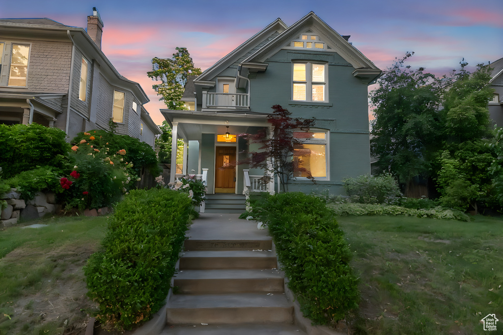 Victorian home with a balcony