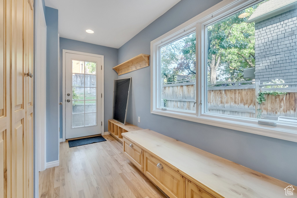 Mudroom featuring light wood-style floors, baseboards, and recessed lighting