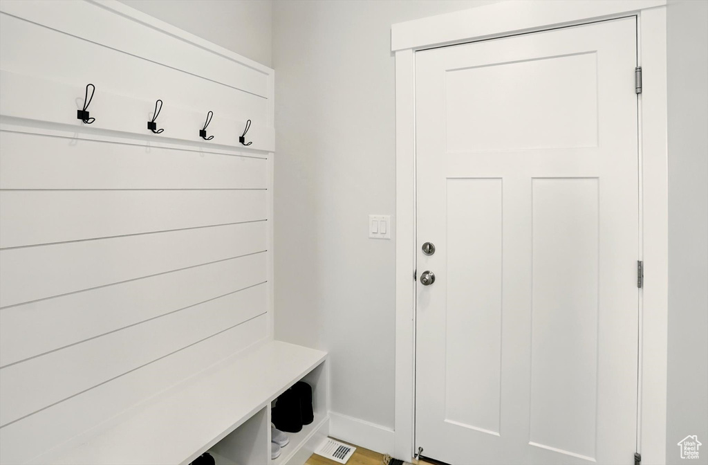 Mudroom featuring baseboards
