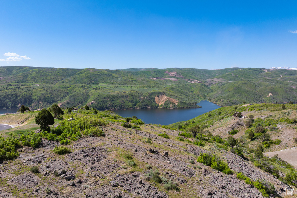 View of mountain background featuring a nearby body of water