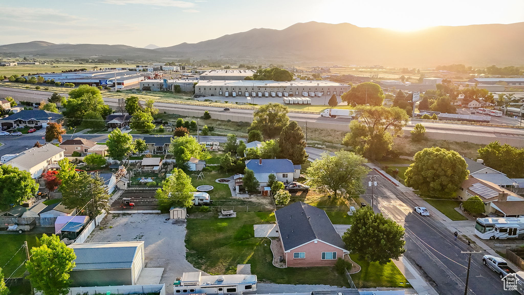 Aerial view of residential area featuring a mountainous background