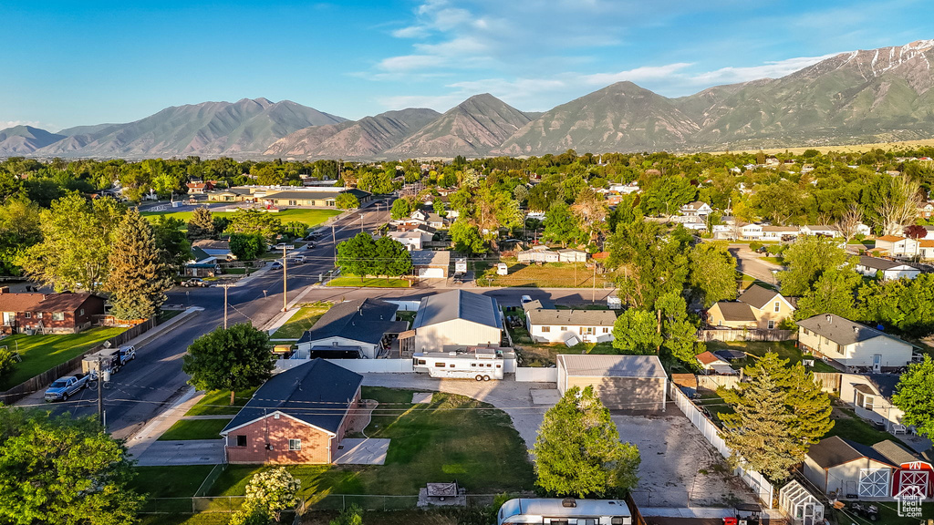 Aerial view of residential area with a mountain backdrop