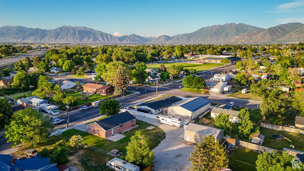 Aerial view of residential area featuring mountains