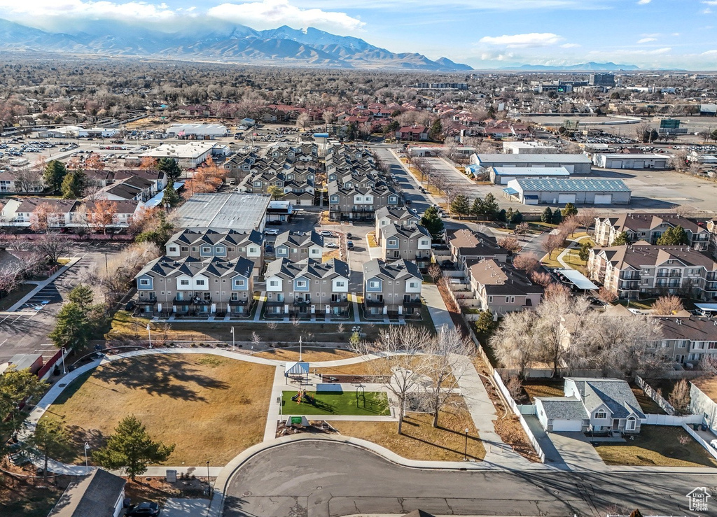 Aerial view of residential area with a mountainous background