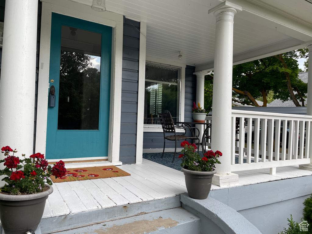Entrance to property with a porch