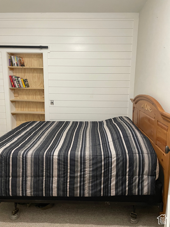 Bedroom with carpet flooring