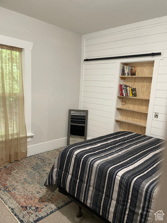 Bedroom featuring baseboards
