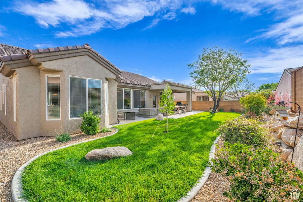 View of yard featuring a patio area