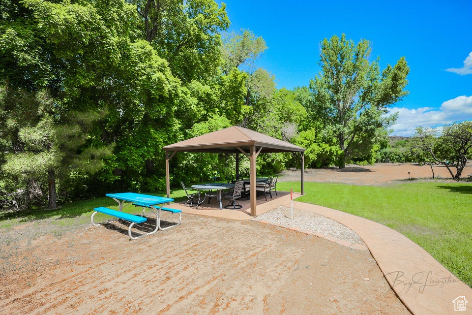 View of patio featuring a gazebo