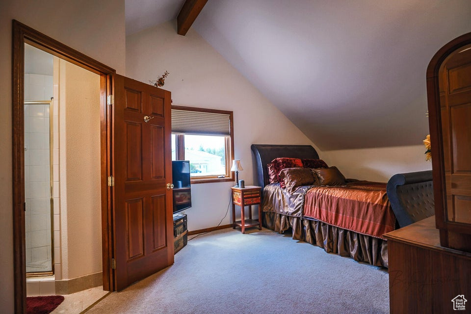 Bedroom with carpet floors and baseboards
