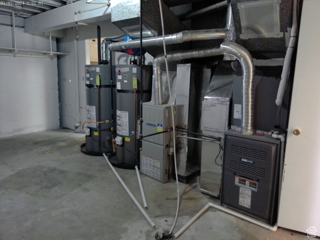 Utilities with strapped water heater and gas water heater