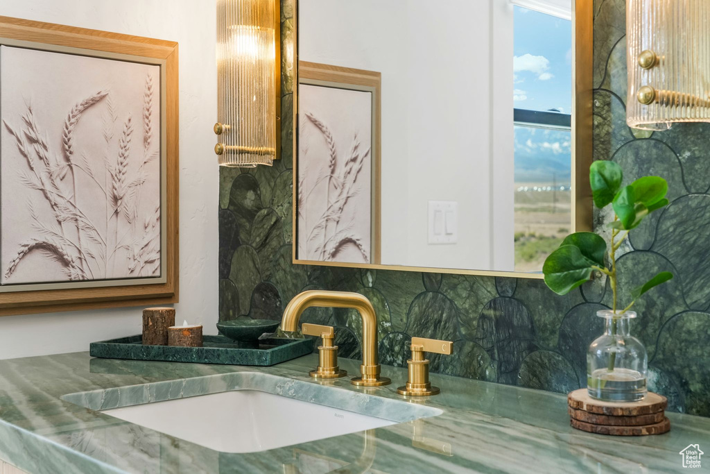 Bathroom view of backsplash and vanity