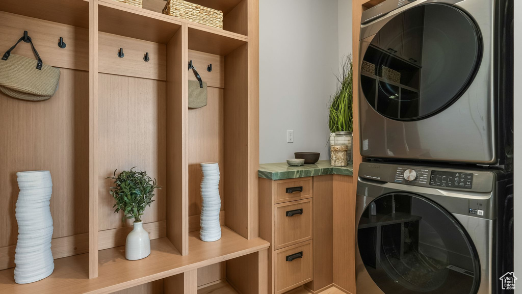 Laundry room with stacked washer / drying machine
