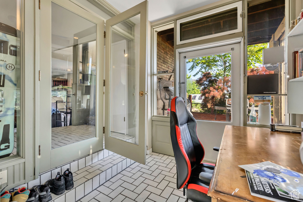 Office featuring brick patterned floors
