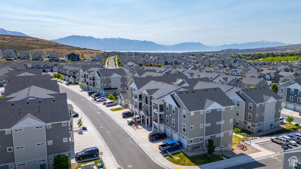 Aerial view of residential area with a mountain backdrop