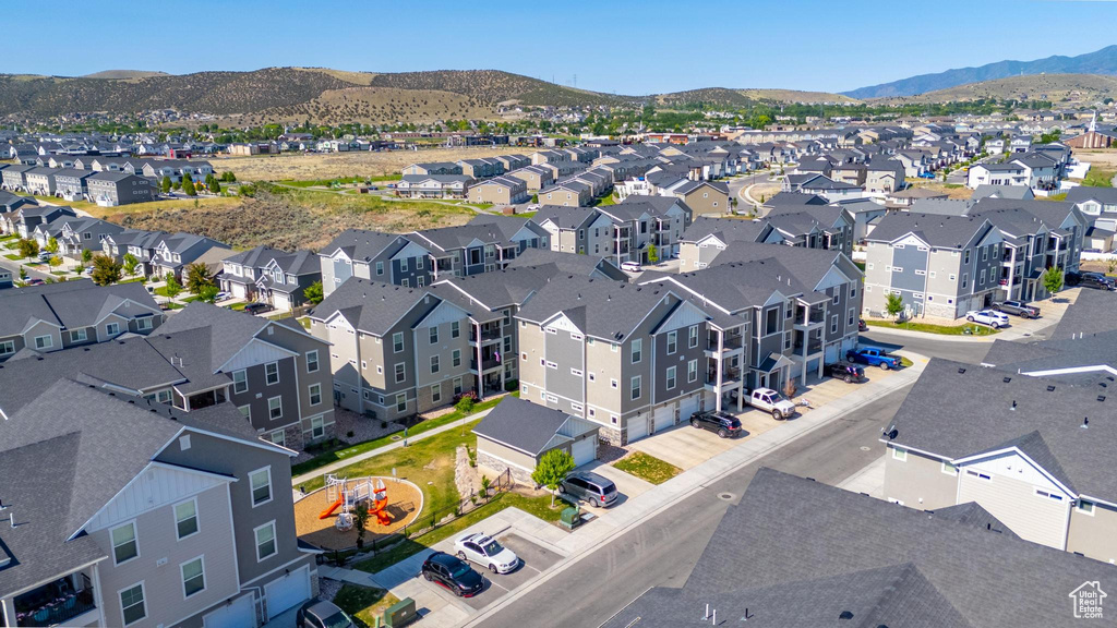 Aerial view of residential area with a mountainous background