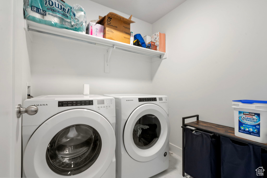 Laundry room with separate washer and dryer