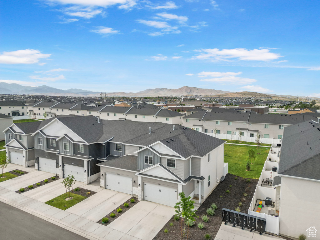 Aerial perspective of suburban area with mountains