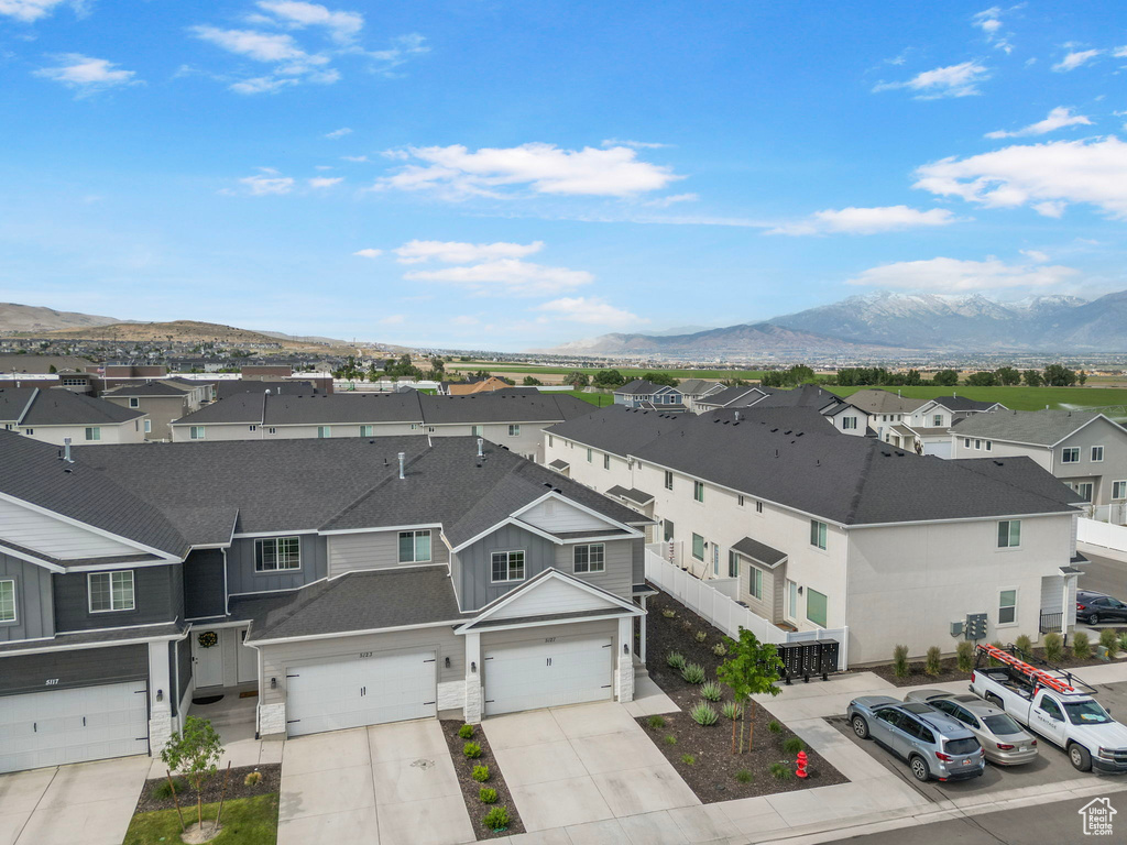 Aerial view of residential area with a mountain backdrop