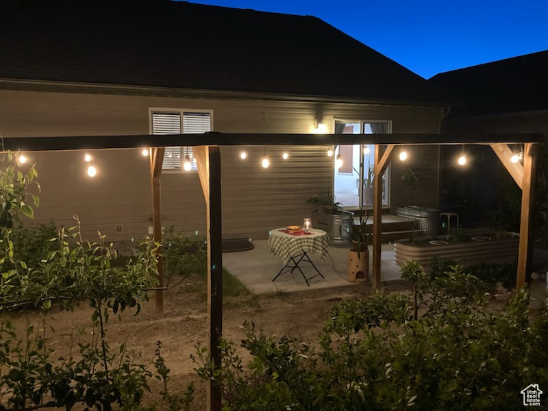Patio at night with a patio