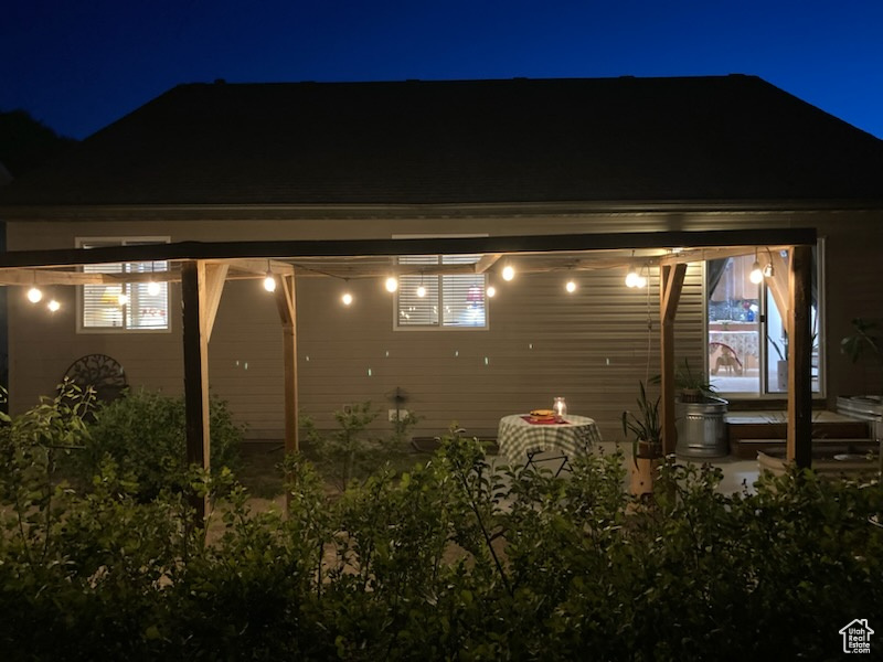 View of property exterior at night