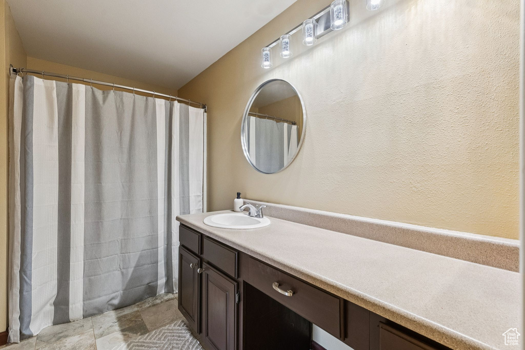 Full bathroom with vanity