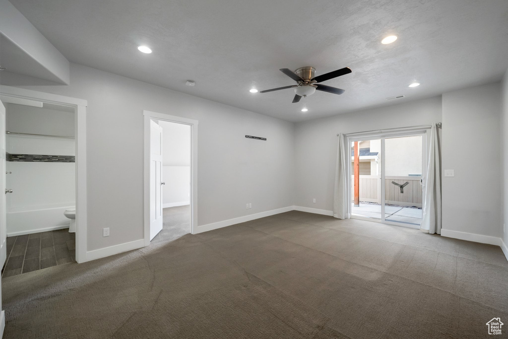 Unfurnished bedroom with recessed lighting, carpet, baseboards, connected bathroom, and access to exterior