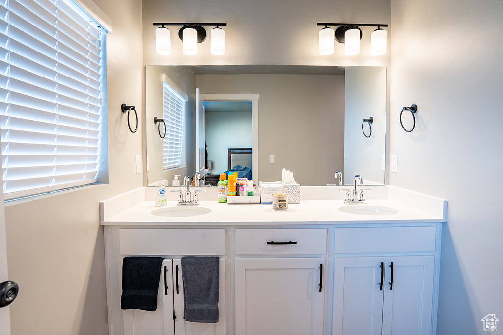 Bathroom featuring double vanity