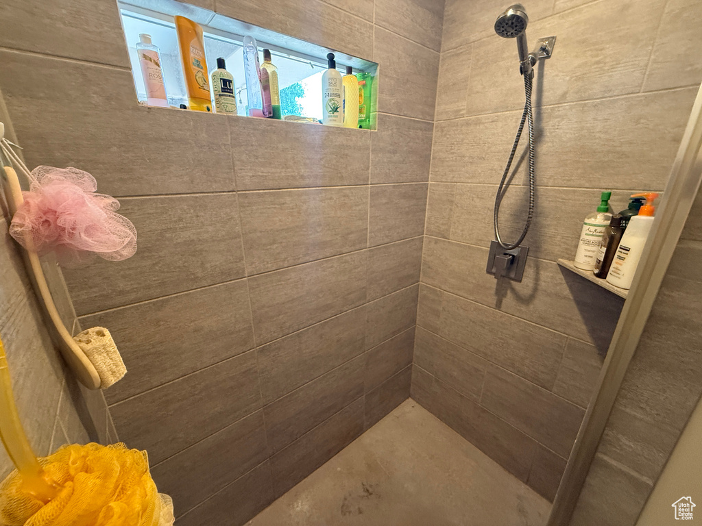 Bathroom with tiled shower