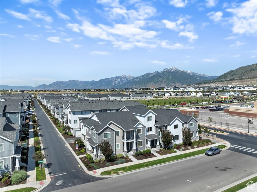 Aerial view of residential area with a mountainous background