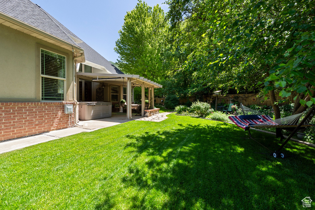 View of yard with a patio area