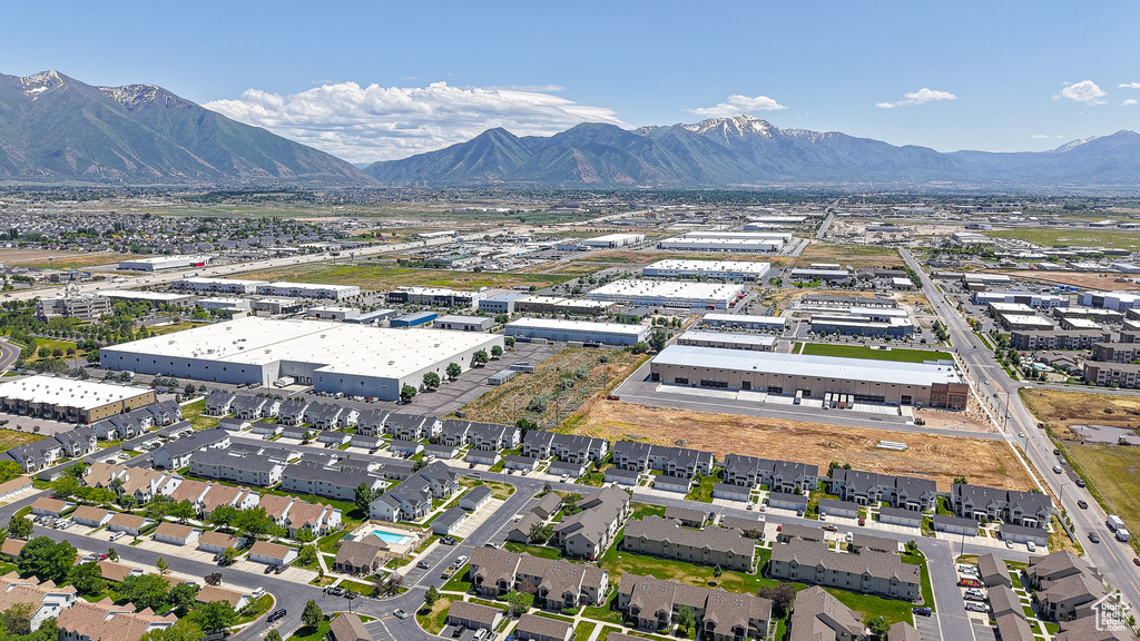 Aerial overview of property\'s location featuring a mountain backdrop