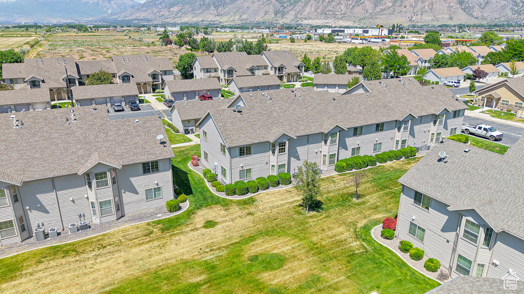 Aerial view of residential area with a mountain backdrop